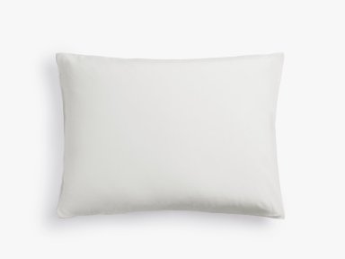 Close Up Of White Silk Pillowcase Set