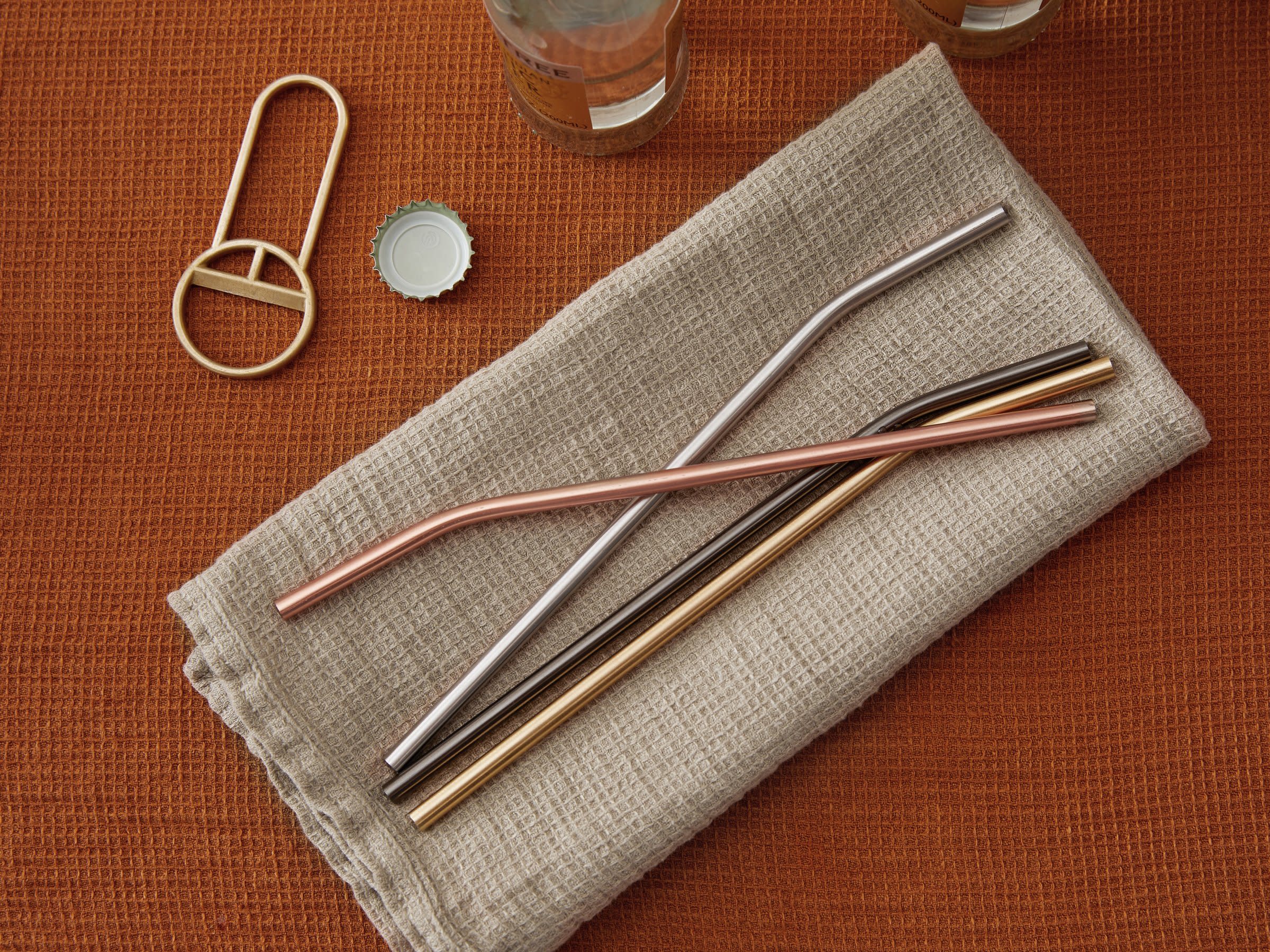 Matte Metallic Stainless Bent Straws Shown In A Room