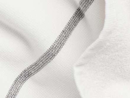 Detail image of a cream fouta stripe towel