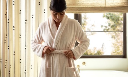 woman standing infront of a shower curtain