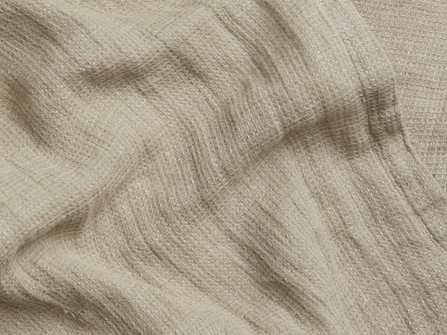 Close Up Of Natural Linen Waffle Tabletop Collection