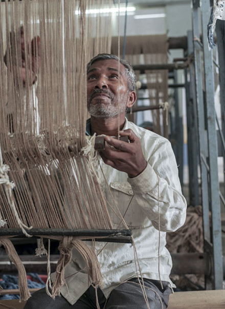 Man weaving 