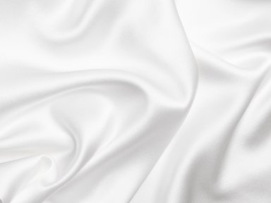 Close Up Of White Silk Pillowcase