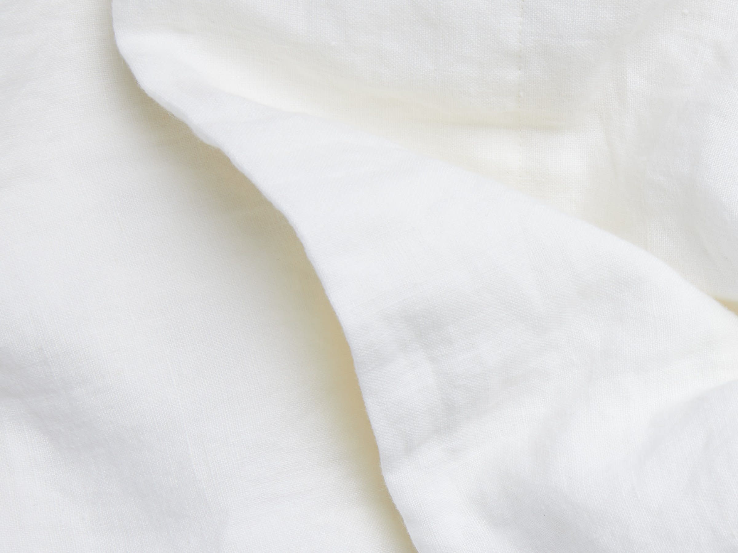 Close Up Of White Washed Linen Curtain