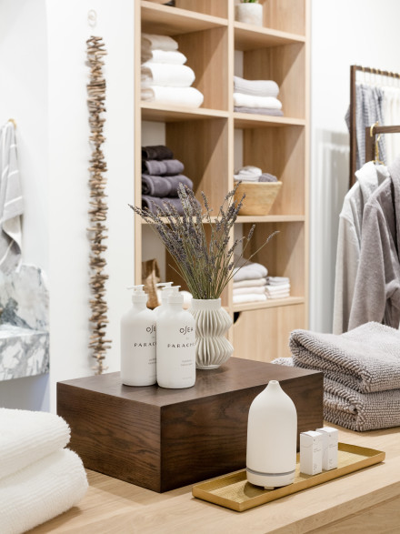 Random assortment of home items stacked on wall shelving