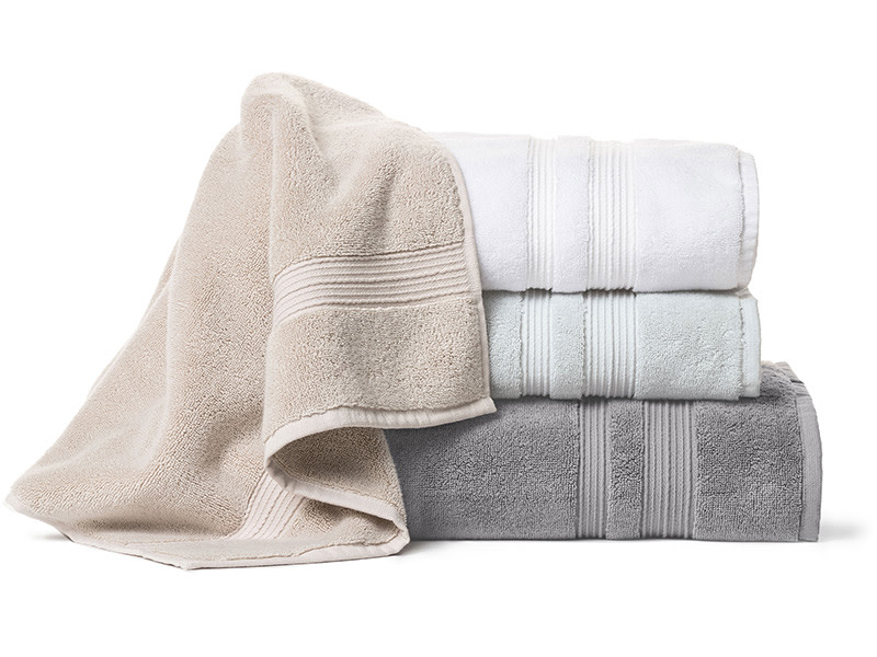 A set of folded bath towels.
