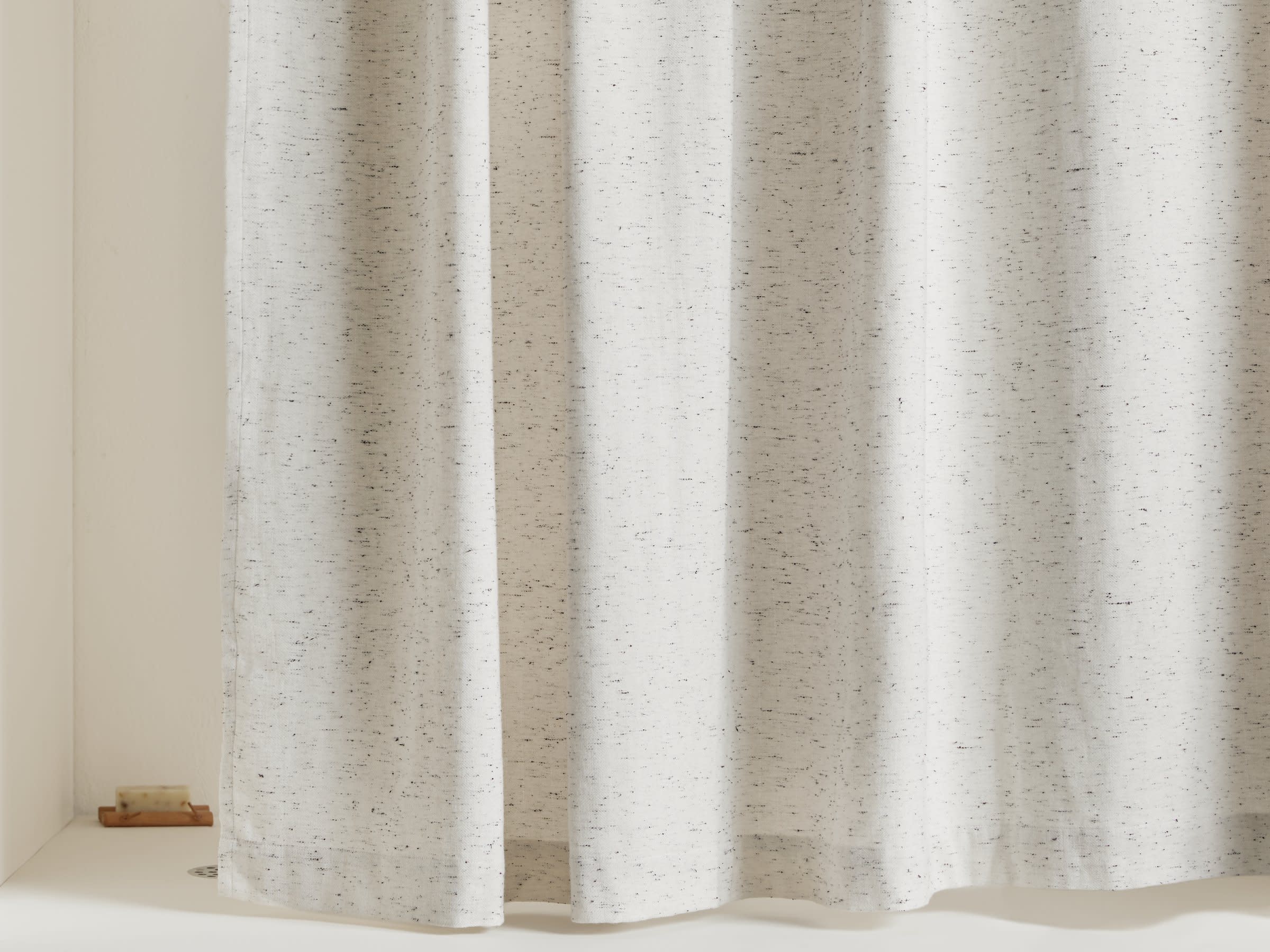 Speckled Shower Curtain Shown In A Room