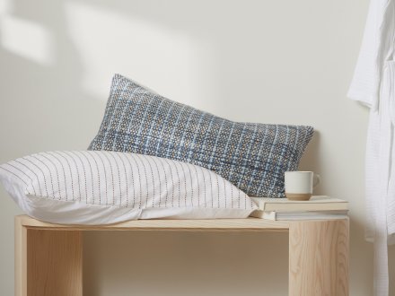 Indigo Lumbar Pillow Shown In A Room