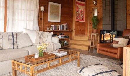 Living room with redwood panelling.