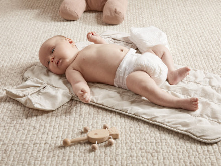 Travel Changing Pad Shown In A Room