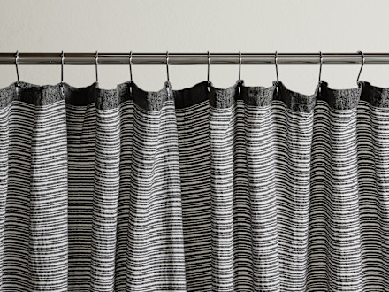 Villa Striped Shower Curtain Shown In A Room