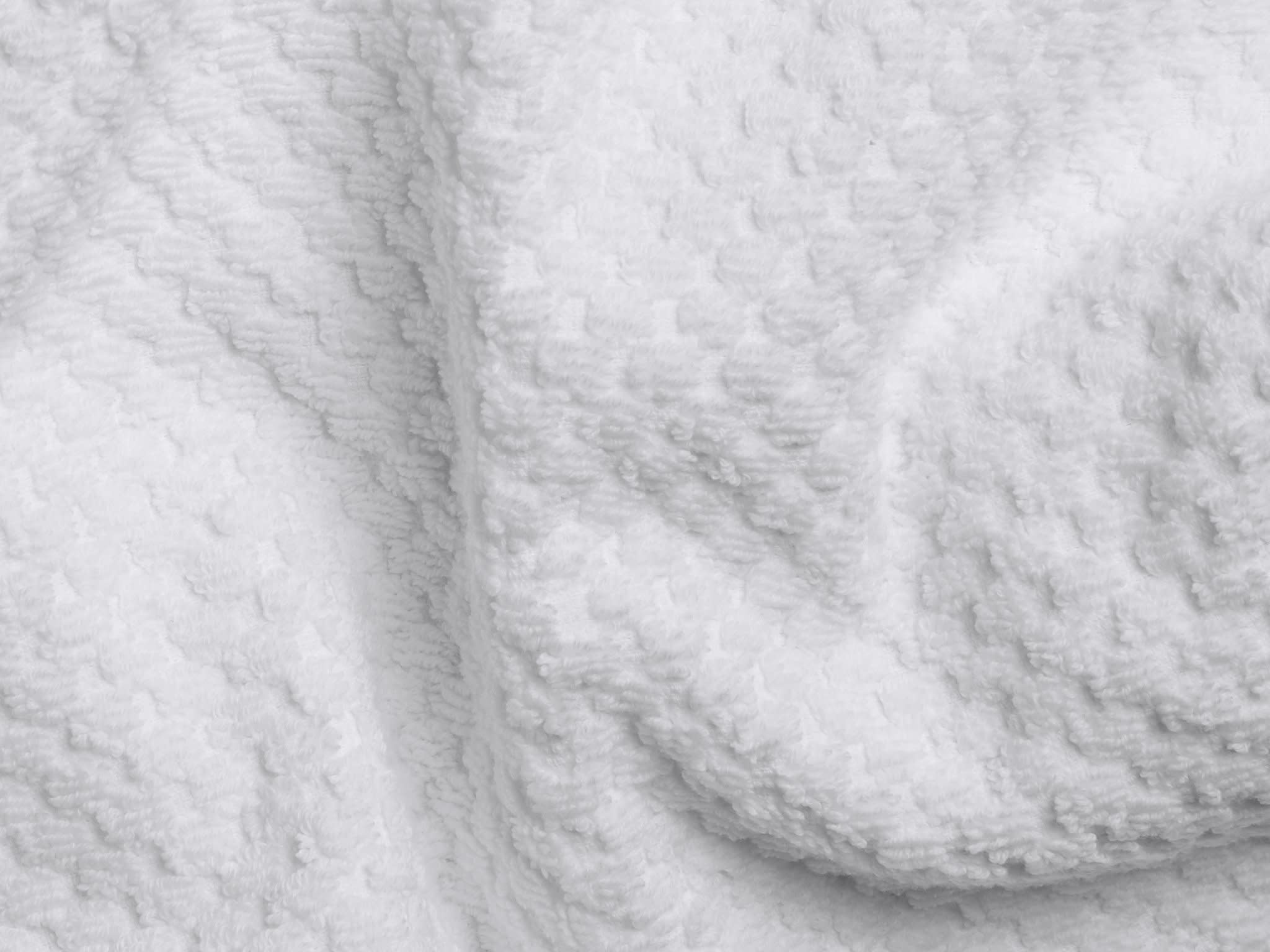 Close Up Of White Tassel Towels