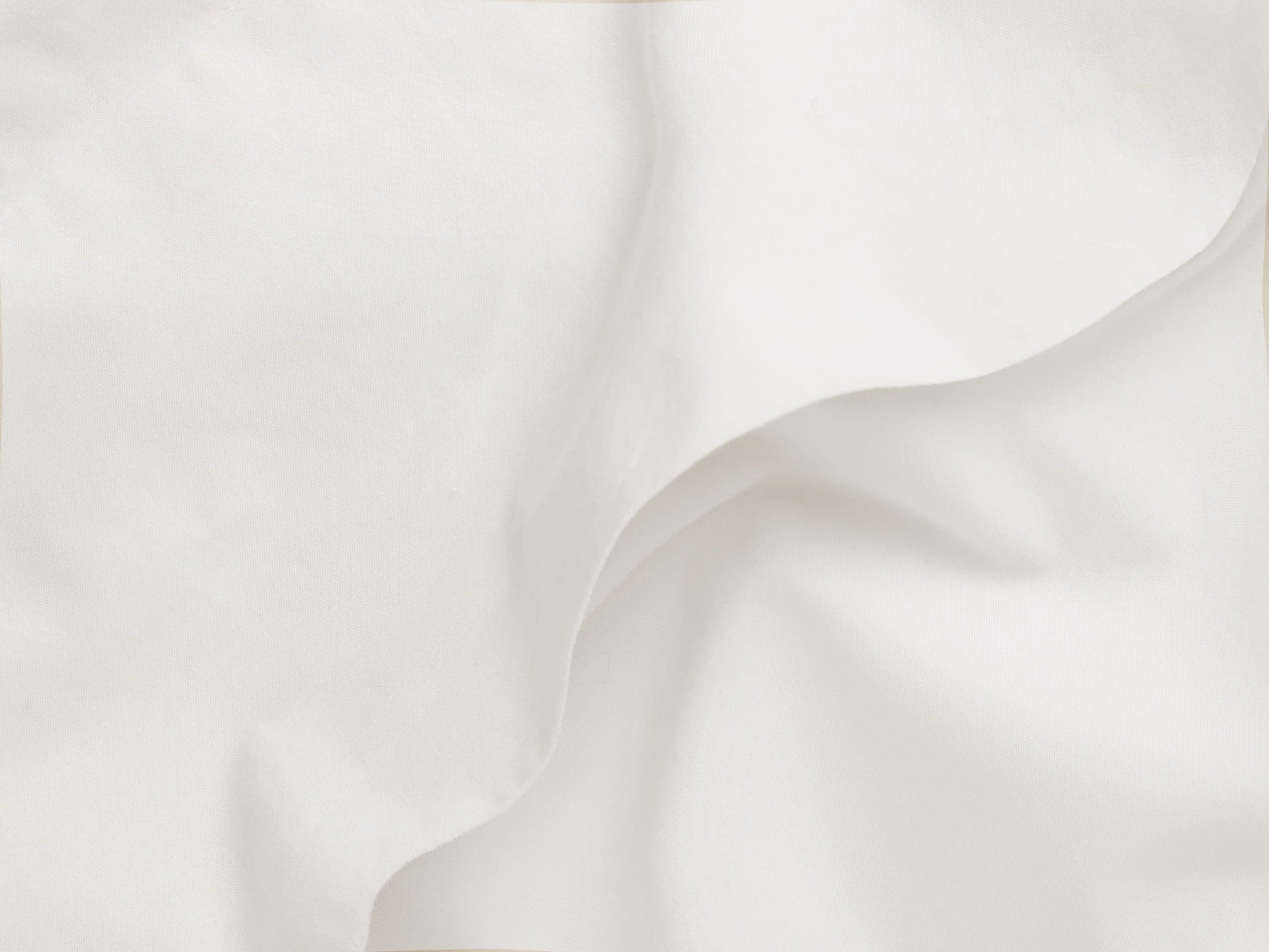 Close Up Of Cream Percale Top Sheet