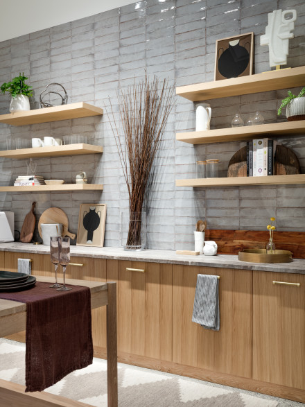 Random assortment of home items stacked on wall shelving