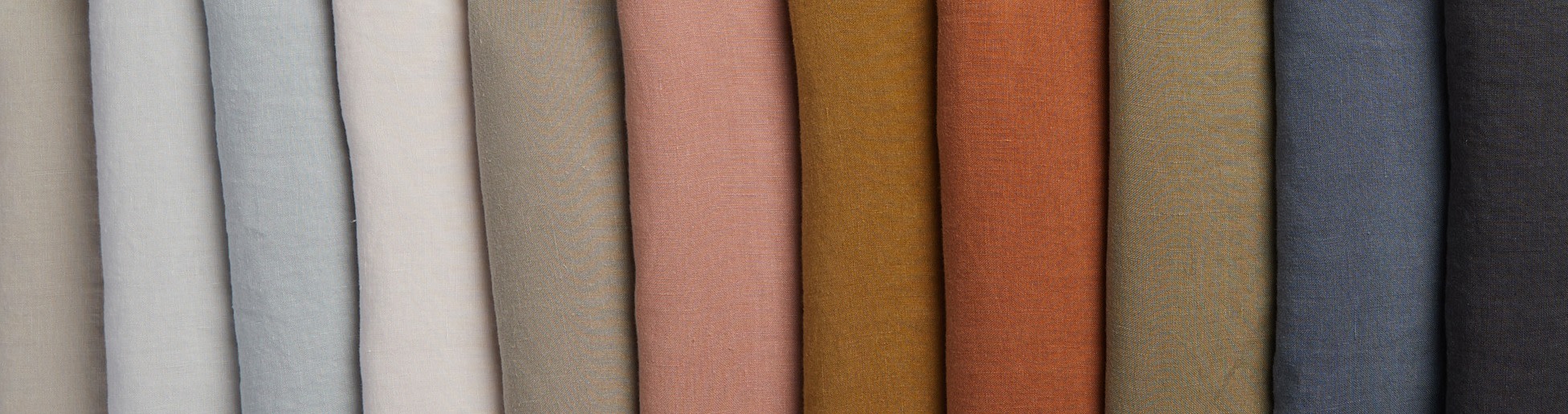 a rainbow of linen colored fabric swatches