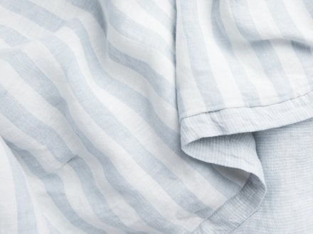 Close Up Of Striped Linen Baby Quilt