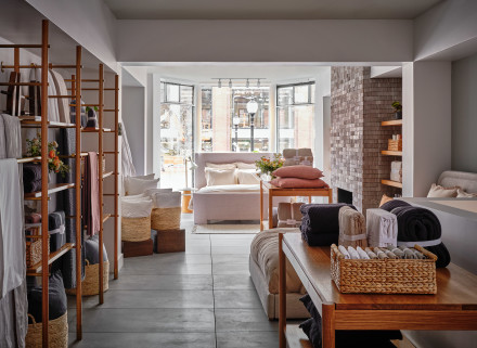 Interior of a Parachute store with various bedding and bath textiles