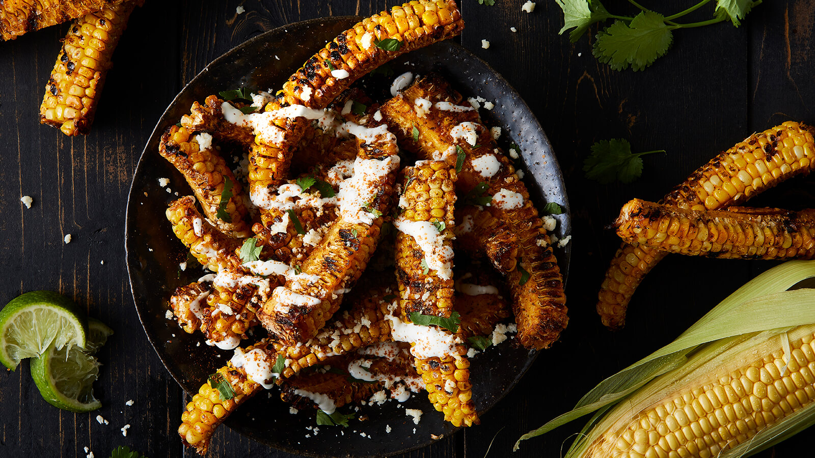 Citrus Mojo Corn Ribs with Lime Crema