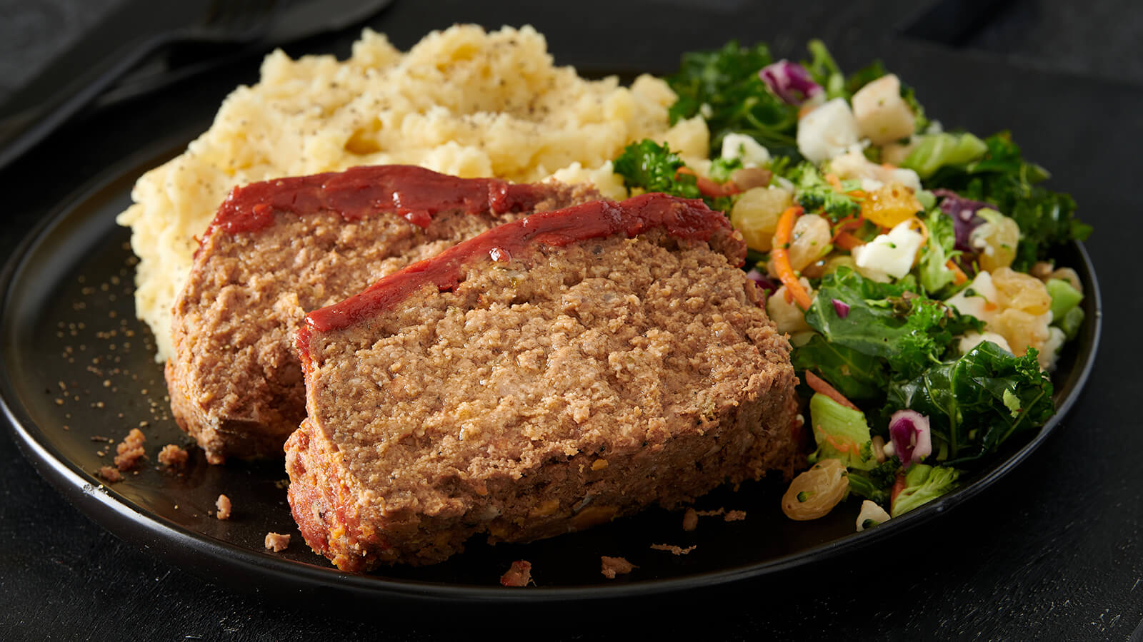 Meatloaf Bistro Meal with mashed potatoes and veggie salad.