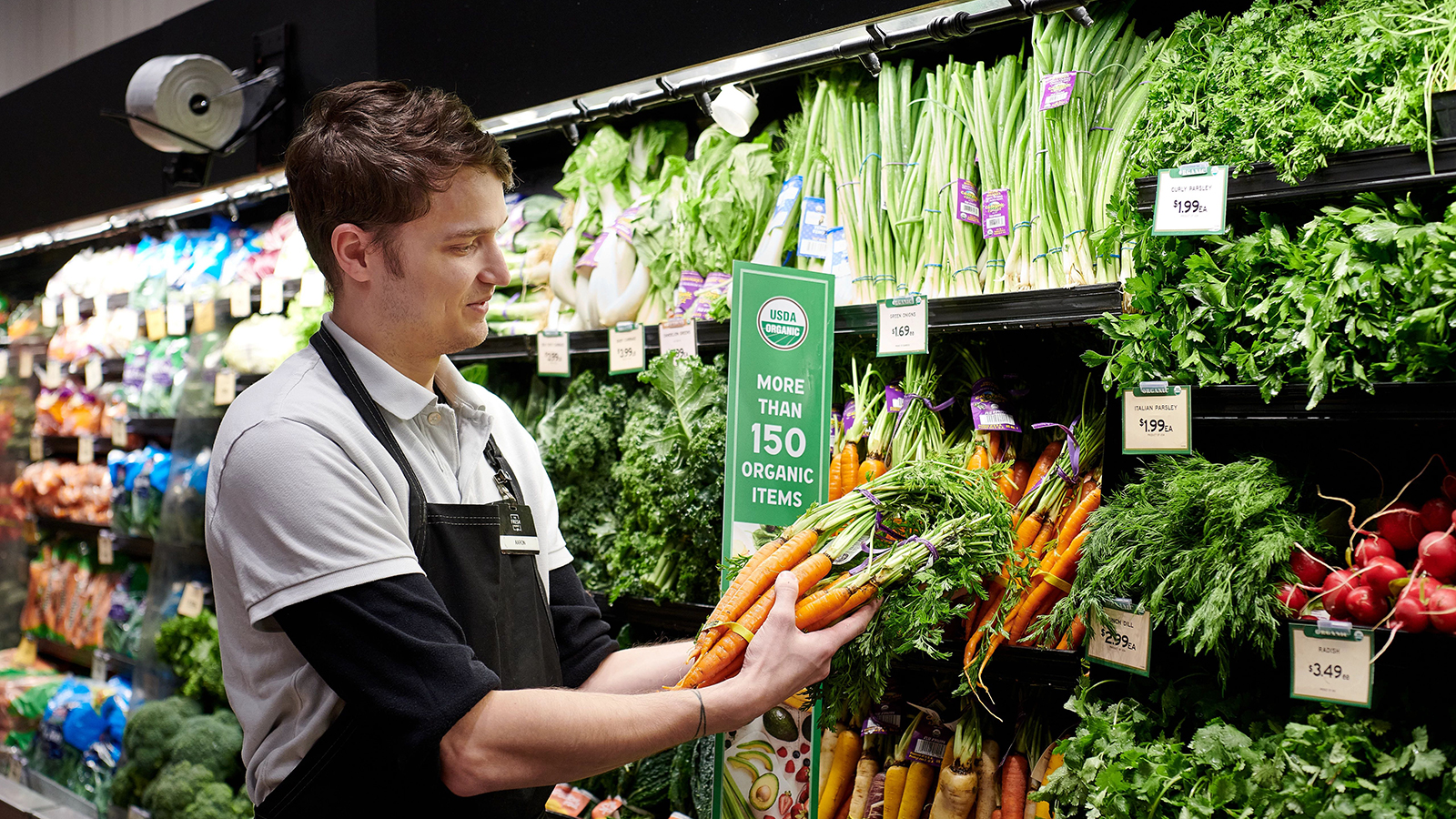 Store Employee Organic Produce Wet Wall