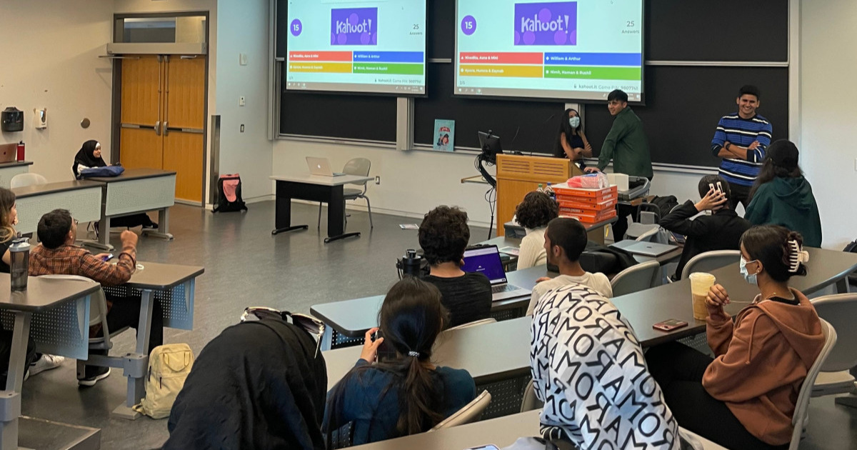 Attendees of Blanket for T.O.'s September 2022 participate in a Kahoot game to test their knowledge on our club.