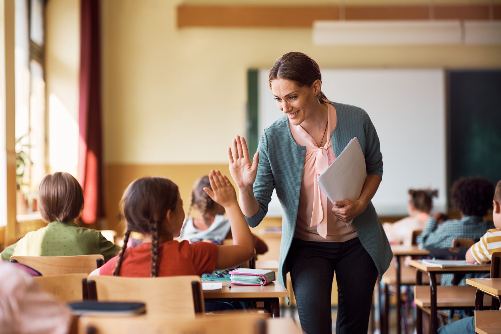Cutting Costs and Carbon: The Economic and Environmental Benefits of Improved IAQ in Schools