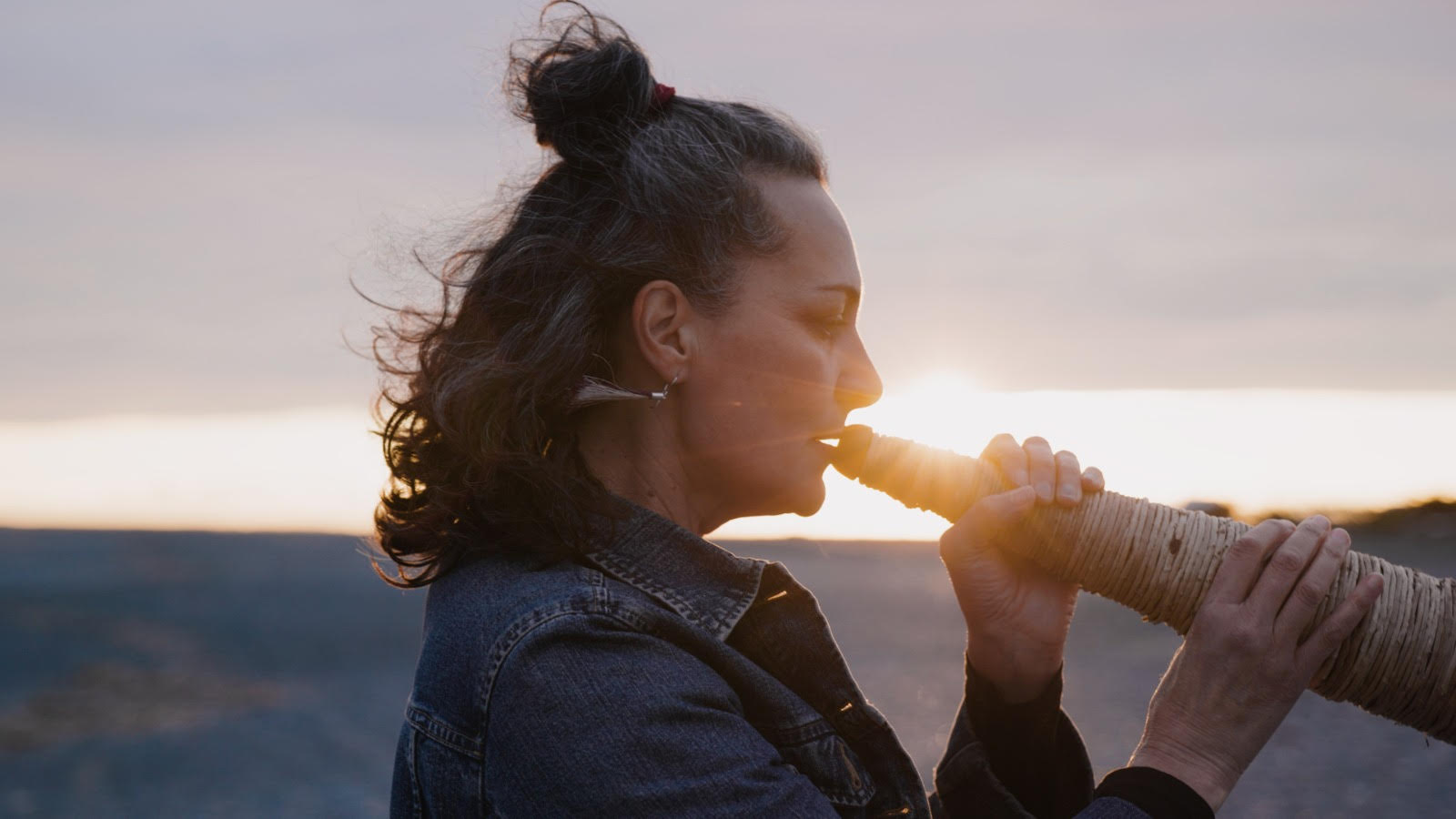 Pictured: Ariana with Pūkāea at sunset, Birdlings Flat, 2020. Photograph by Augusto Creative Agency