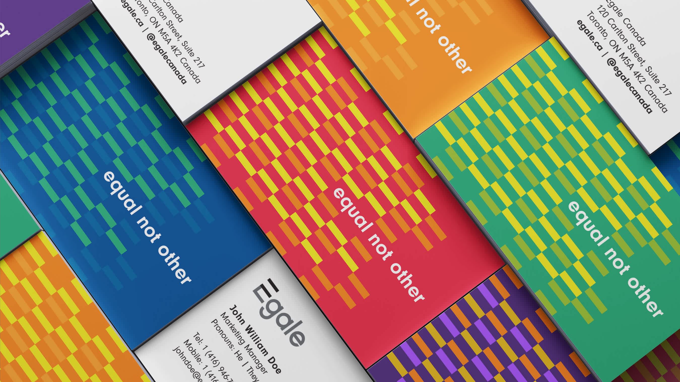 A mock-up of EGALE Canada’s new business card featuring vibrant colours, tagline, and new work mark