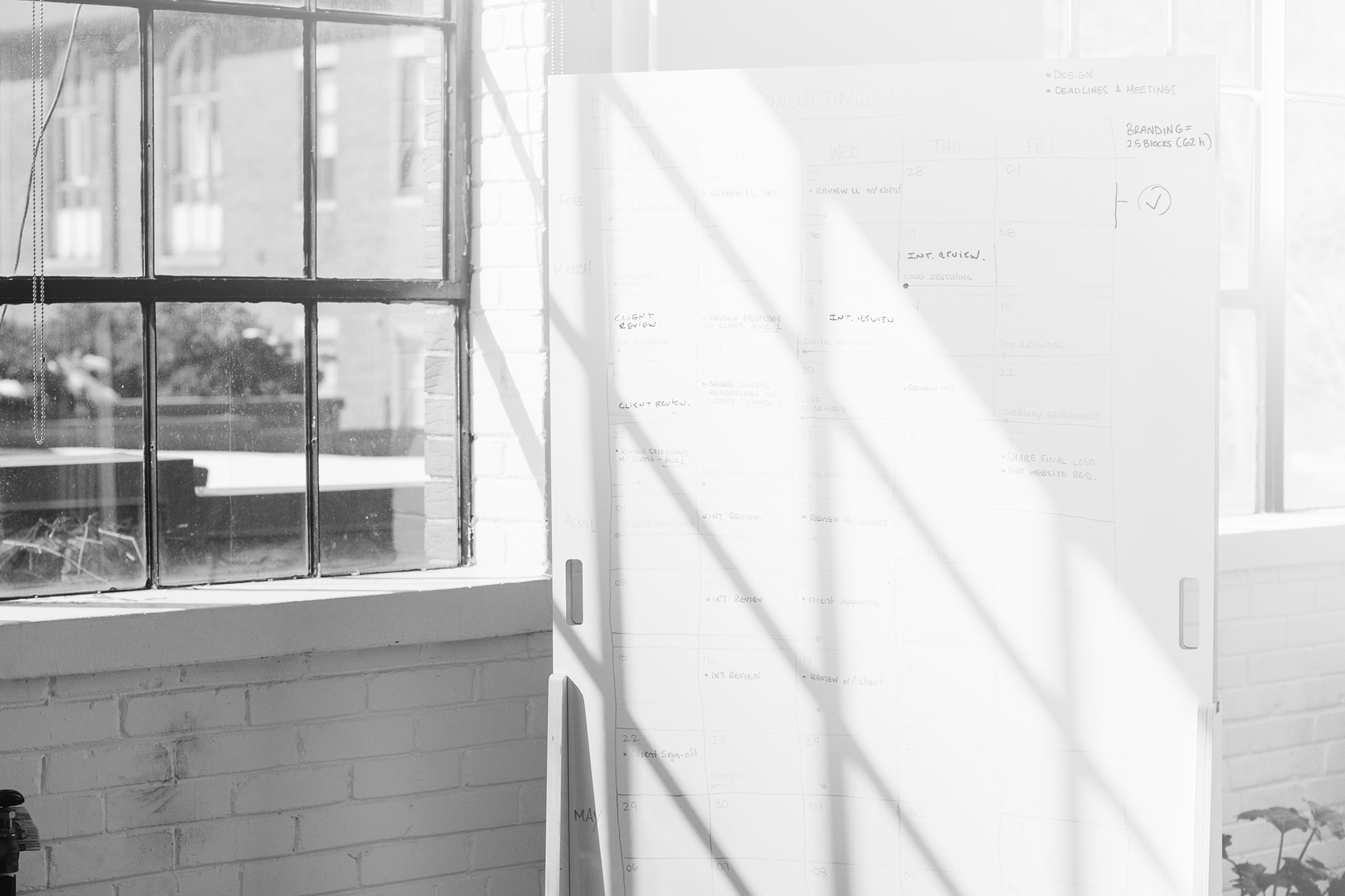 A whiteboard with a schedule on it in an office from Unsplash https://unsplash.com/photos/xSfrOv6x7uQ