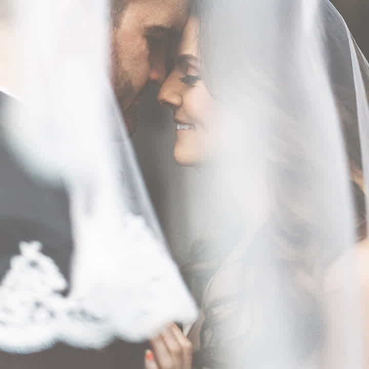 A lifestyle shot showing a couple in white enjoying their special day at Paradise Banquet Halls.