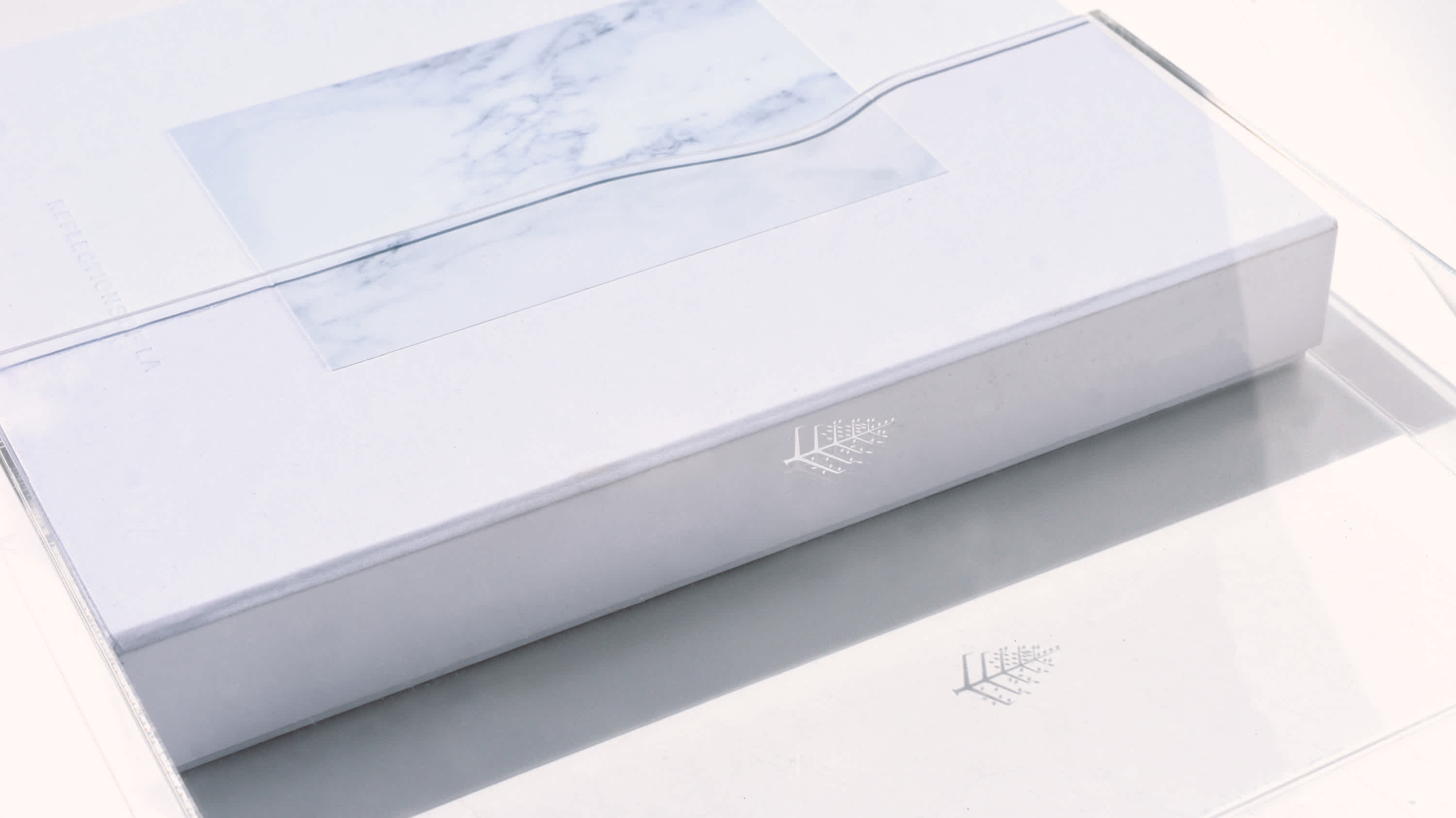 Discover the chic sophistication of the Four Seasons Los Angeles compendium, with a side view revealing the harmonious blend of a marble motif and crisp, white elegance, reflecting LA’s refined taste and luxury living. Ideal for those seeking a touch of LA's design finesse in their collection.