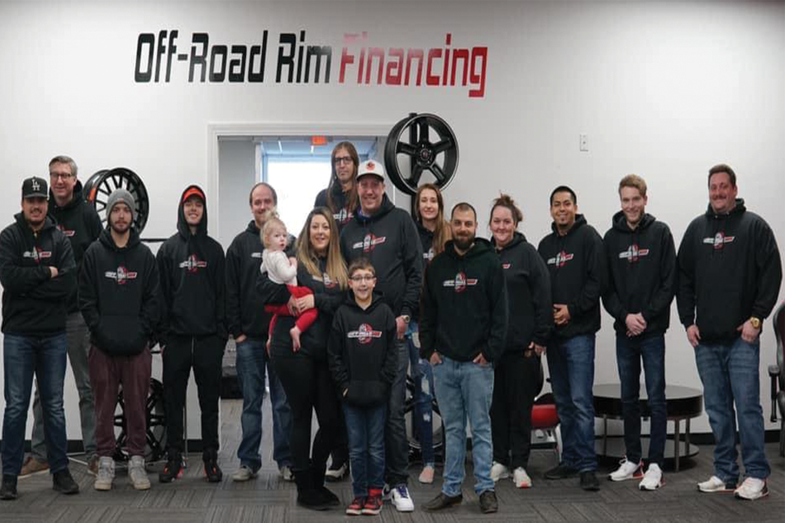 Off Road Rim Financing employees standing for a group photo