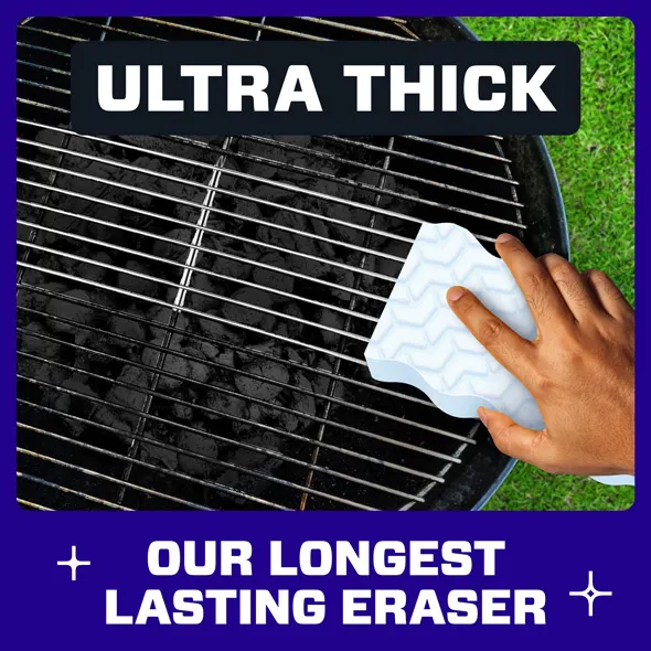 Ultra thick magic eraser being used on a charcoal grill, showcasing effective cleaning power and durability