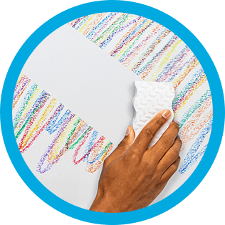 Mr. Clean wipe erasing crayon stains from a wall
