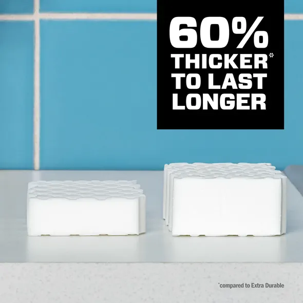 Two Magic Erasers on a countertop, one larger and thicker than the other, highlighting durability and longevity benefits