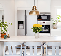 A modern, well-lit, kitchen