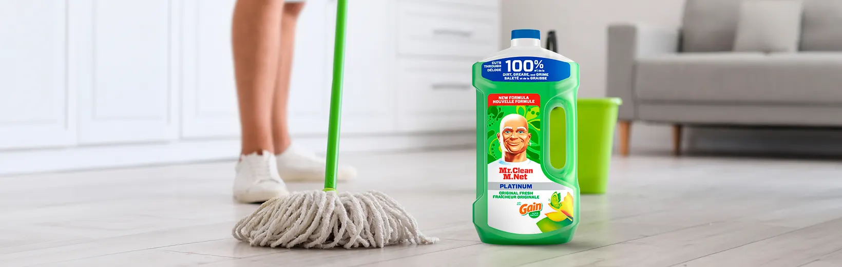 Cleaning Hardwood Floors with a mop and Multi-Surface Cleaner with Gain Original Fresh Scent
