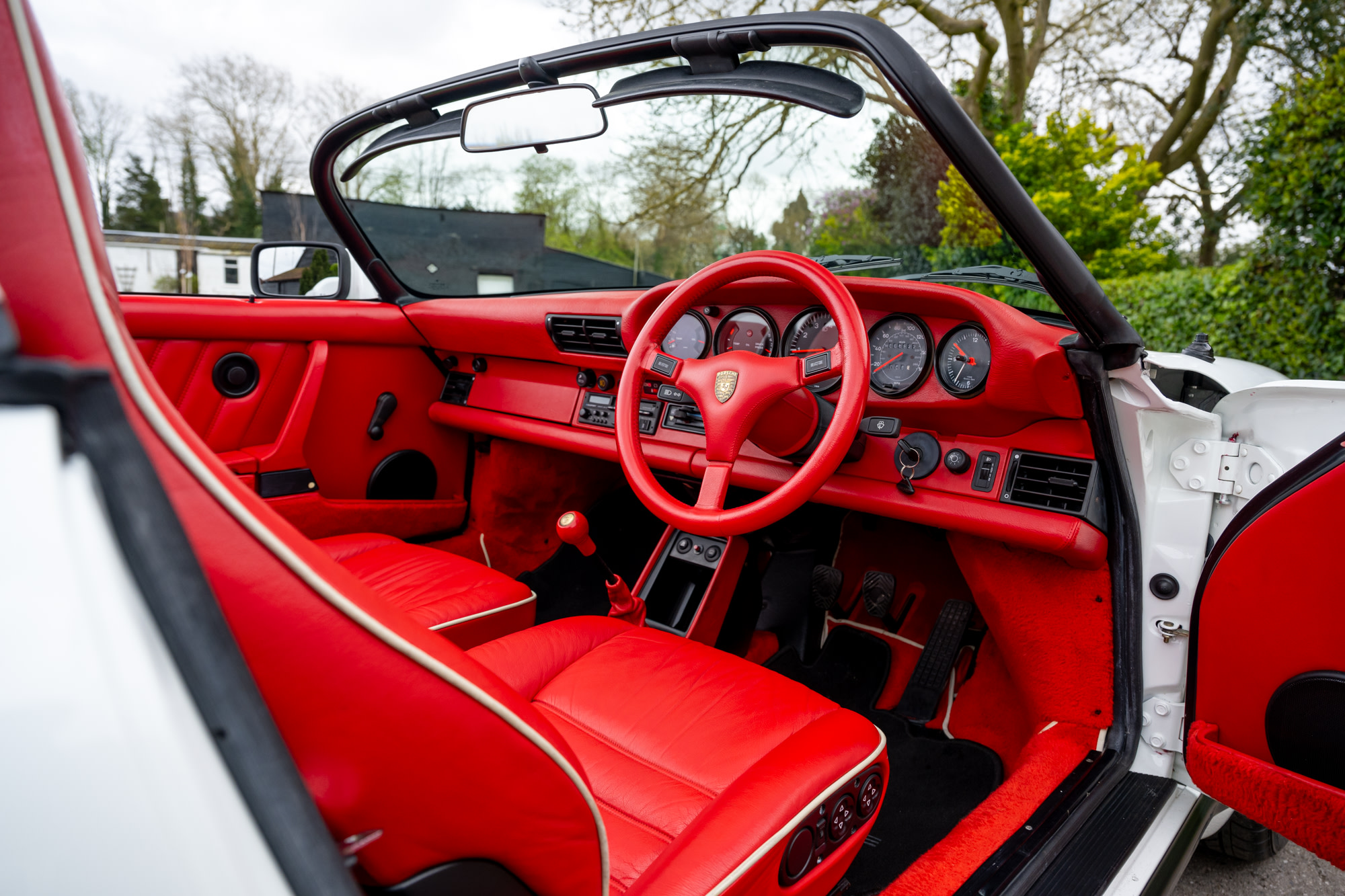 This Porsche 911 3.2 Speedster is a remarkably rare open-top sports car, which has had just four registered keepers from new. 2