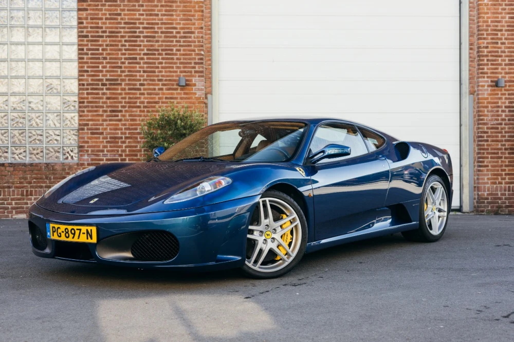 What To Pay For A Ferrari F430 Blu Nart over Cuoio F1 coupe