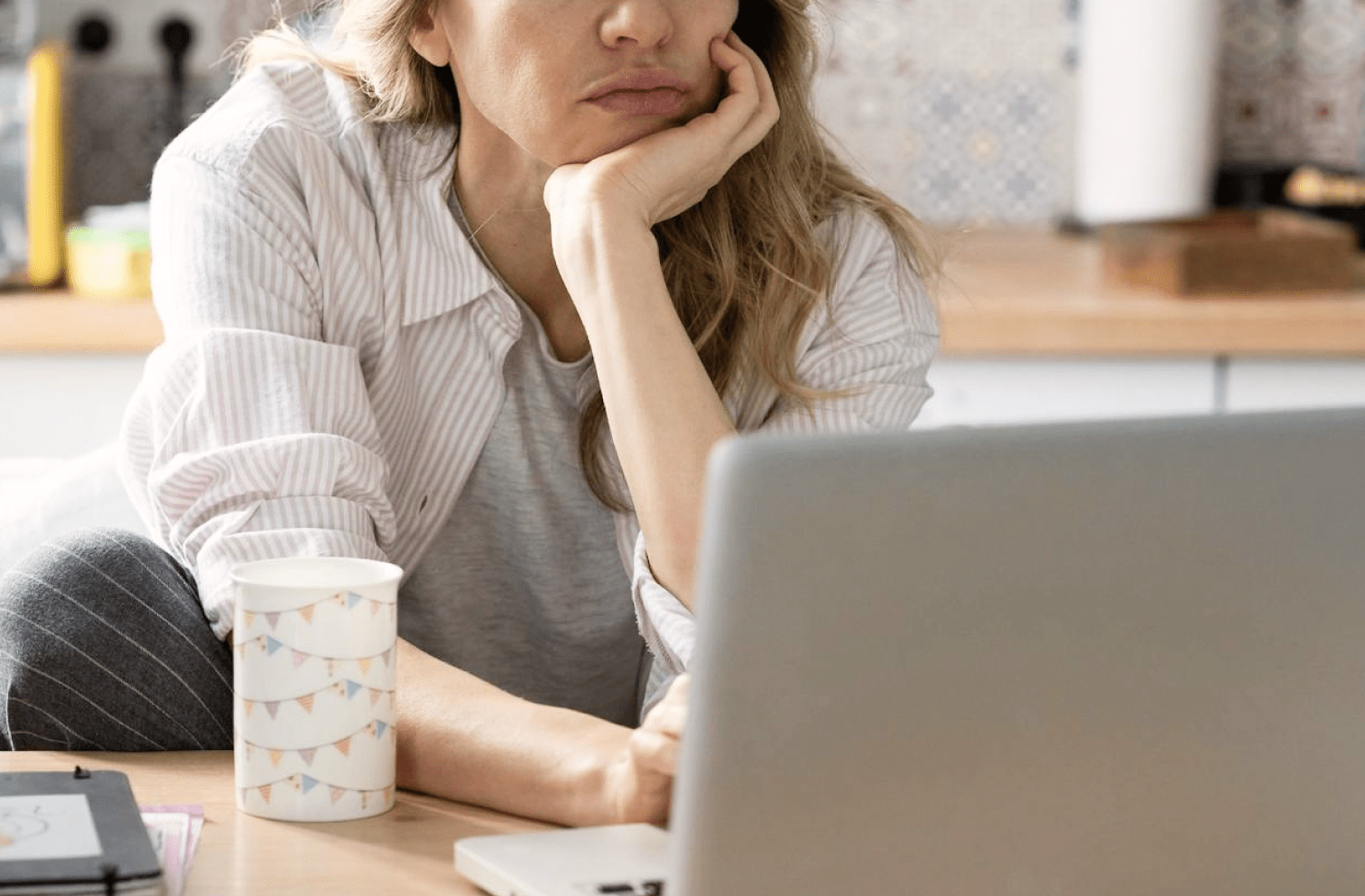 Woman browsing the net using laptop