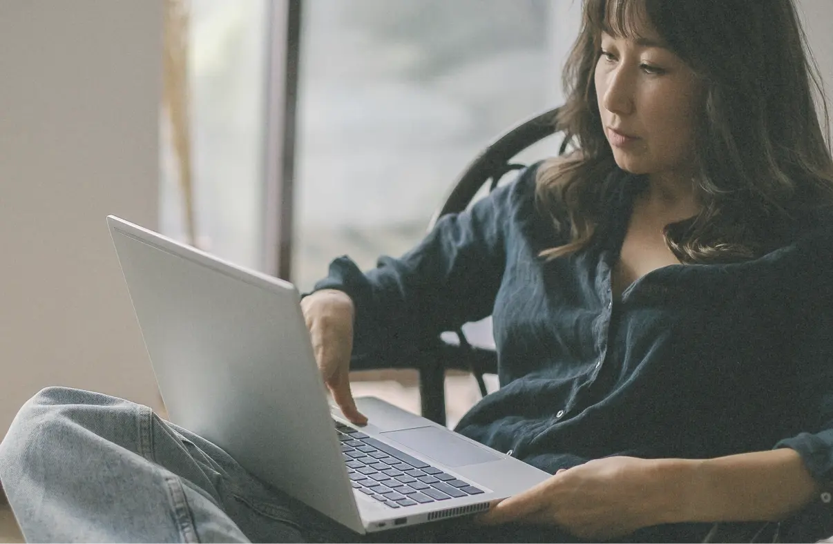 Woman using laptop