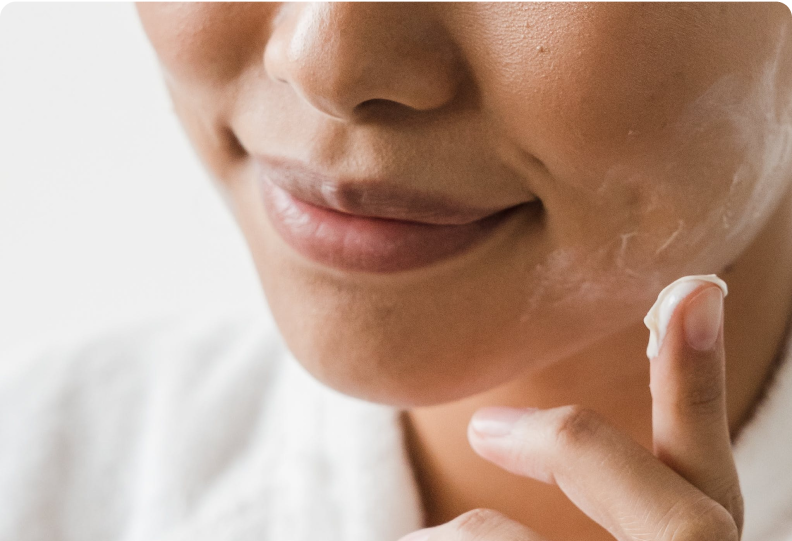 Woman applying cream