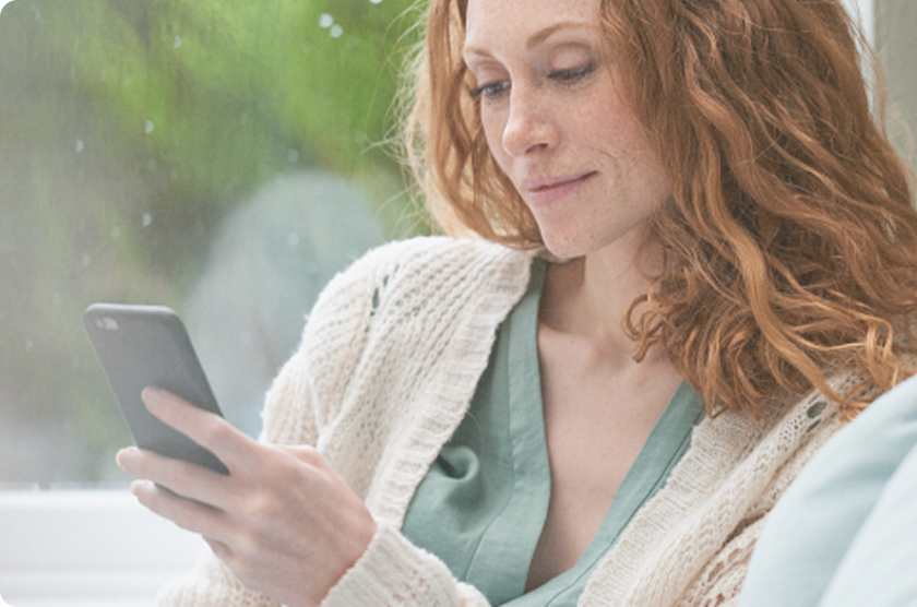 Focus on person-s hand holding a Mobile