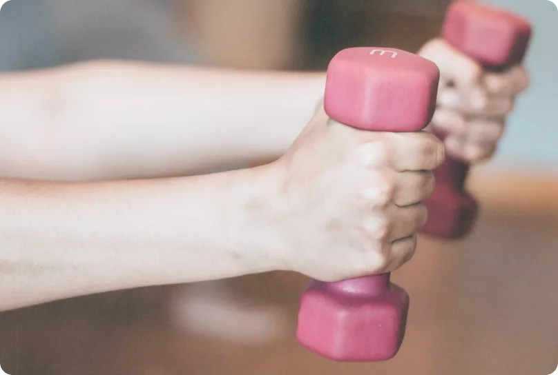 Women holding dumbels