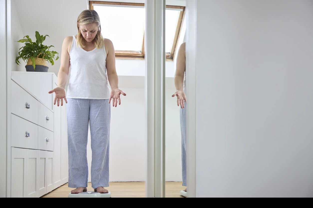 woman-weighing-img