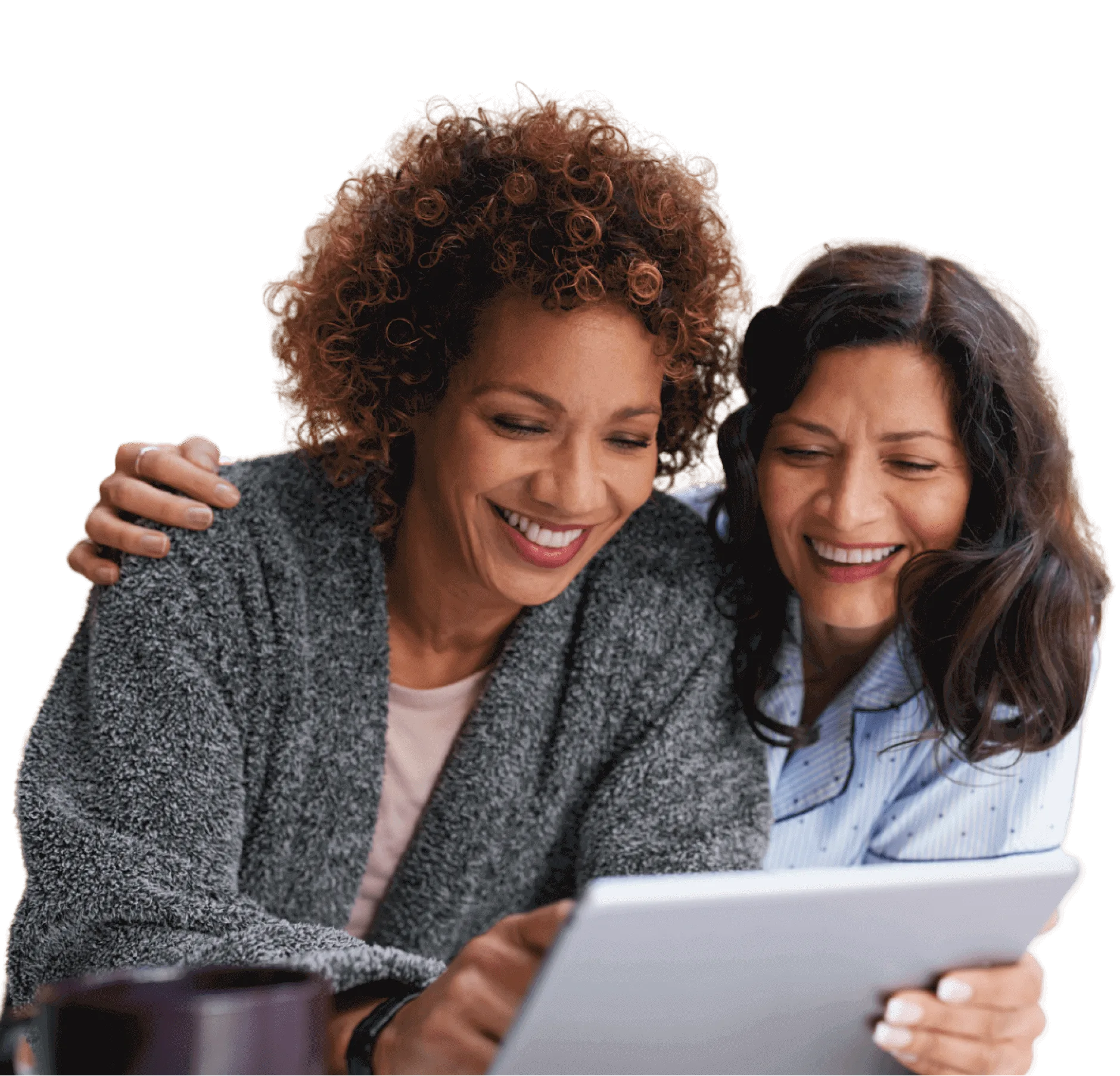 Women talking in front of laptop
