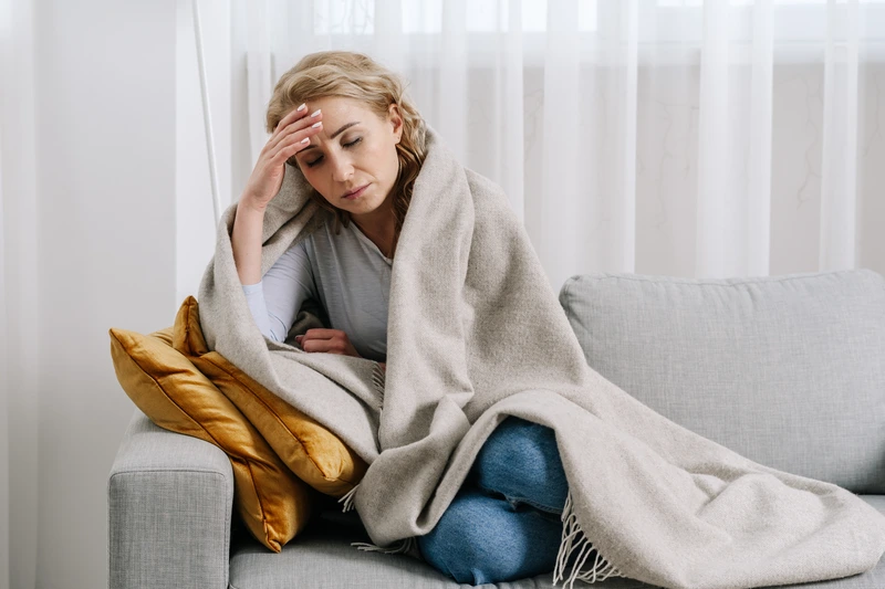 woman sitting in couch