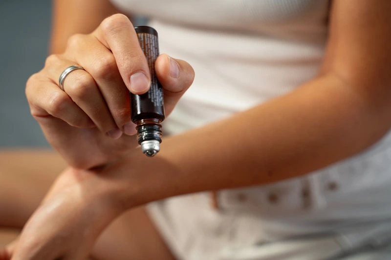 Woman applying oil