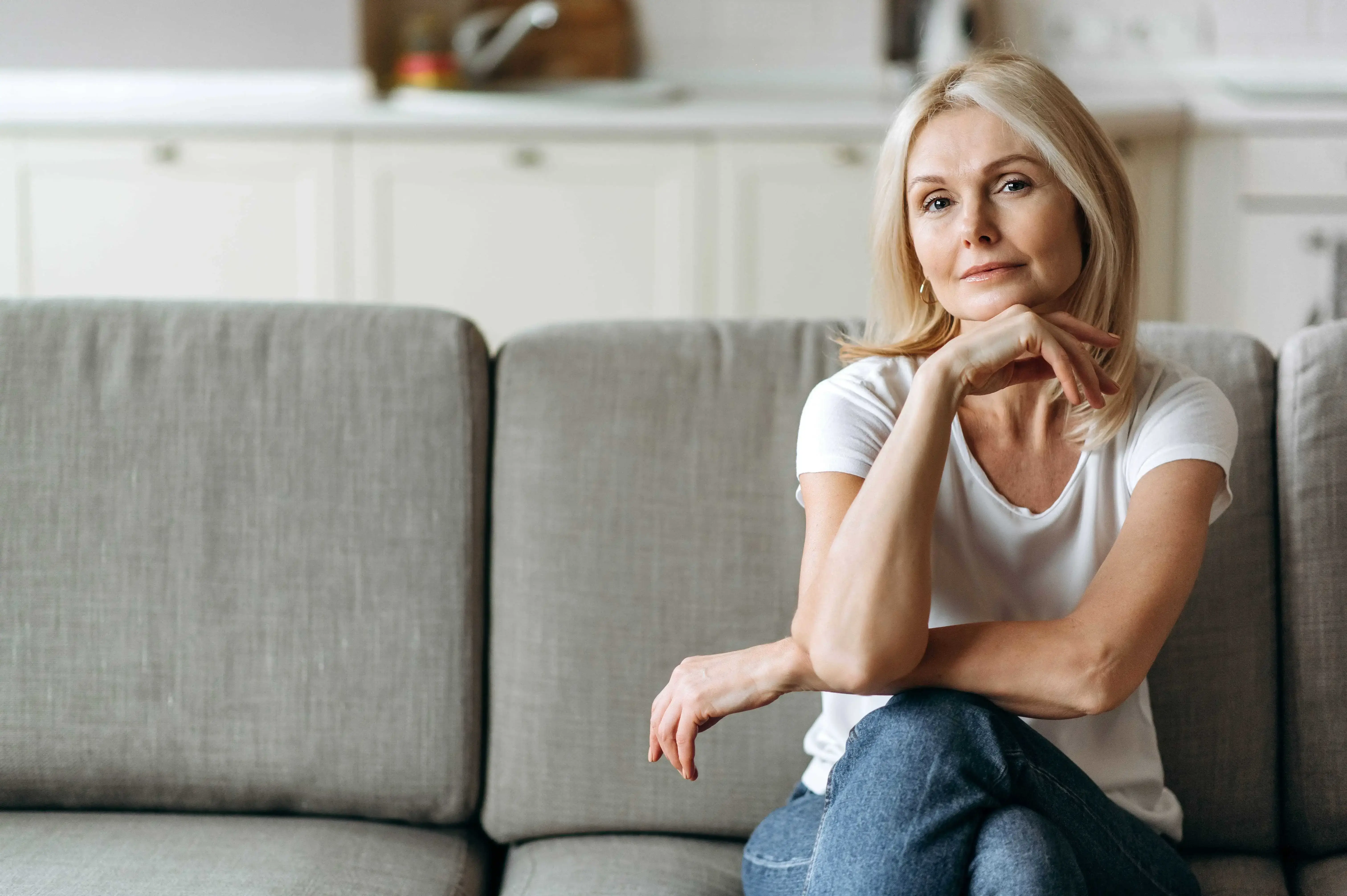 Woman sitting on a couch