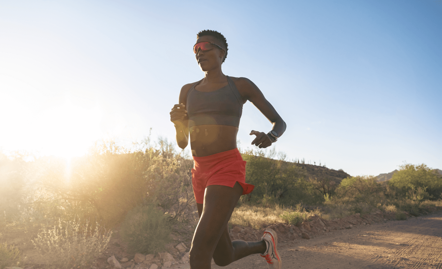 Woman wearing her Garmin watch while exercising